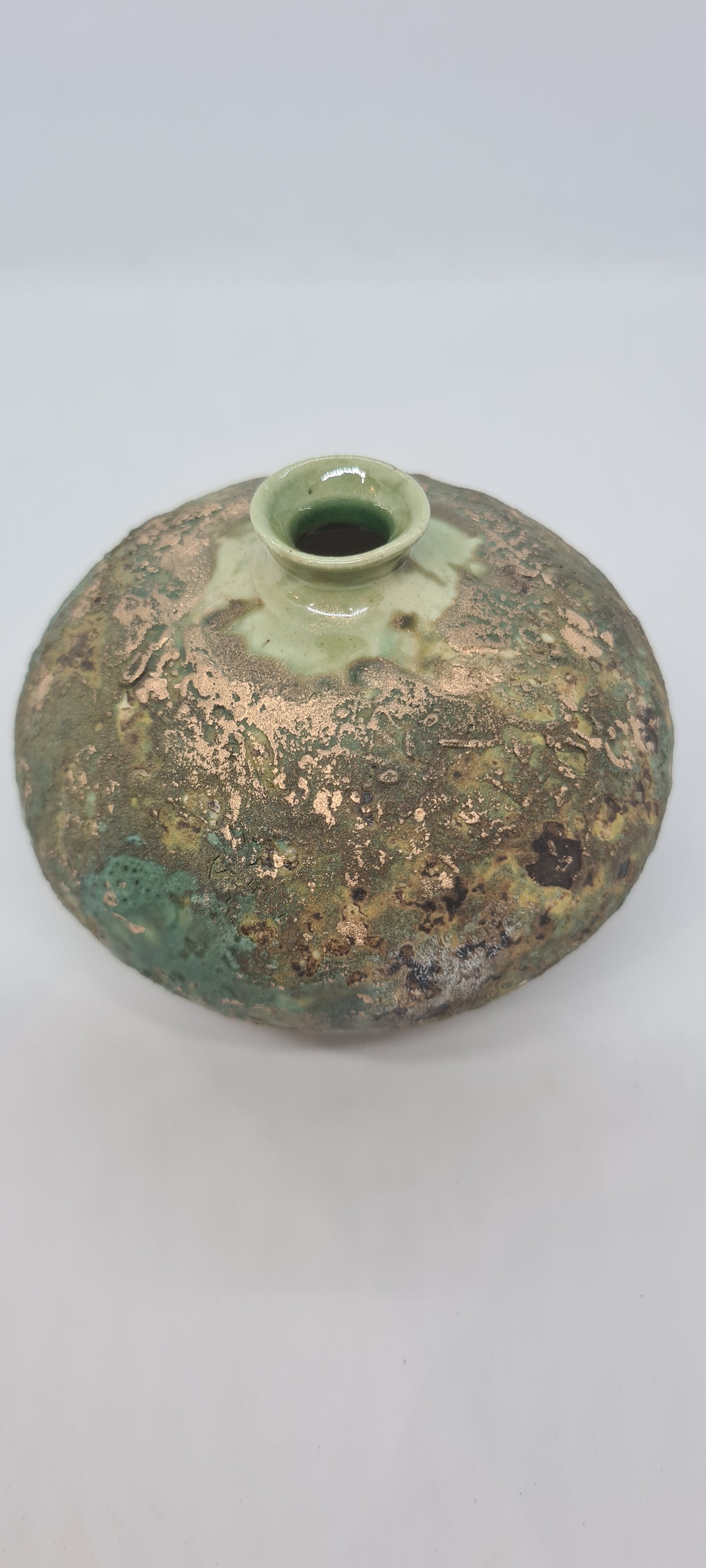 Small rough green glazed vases