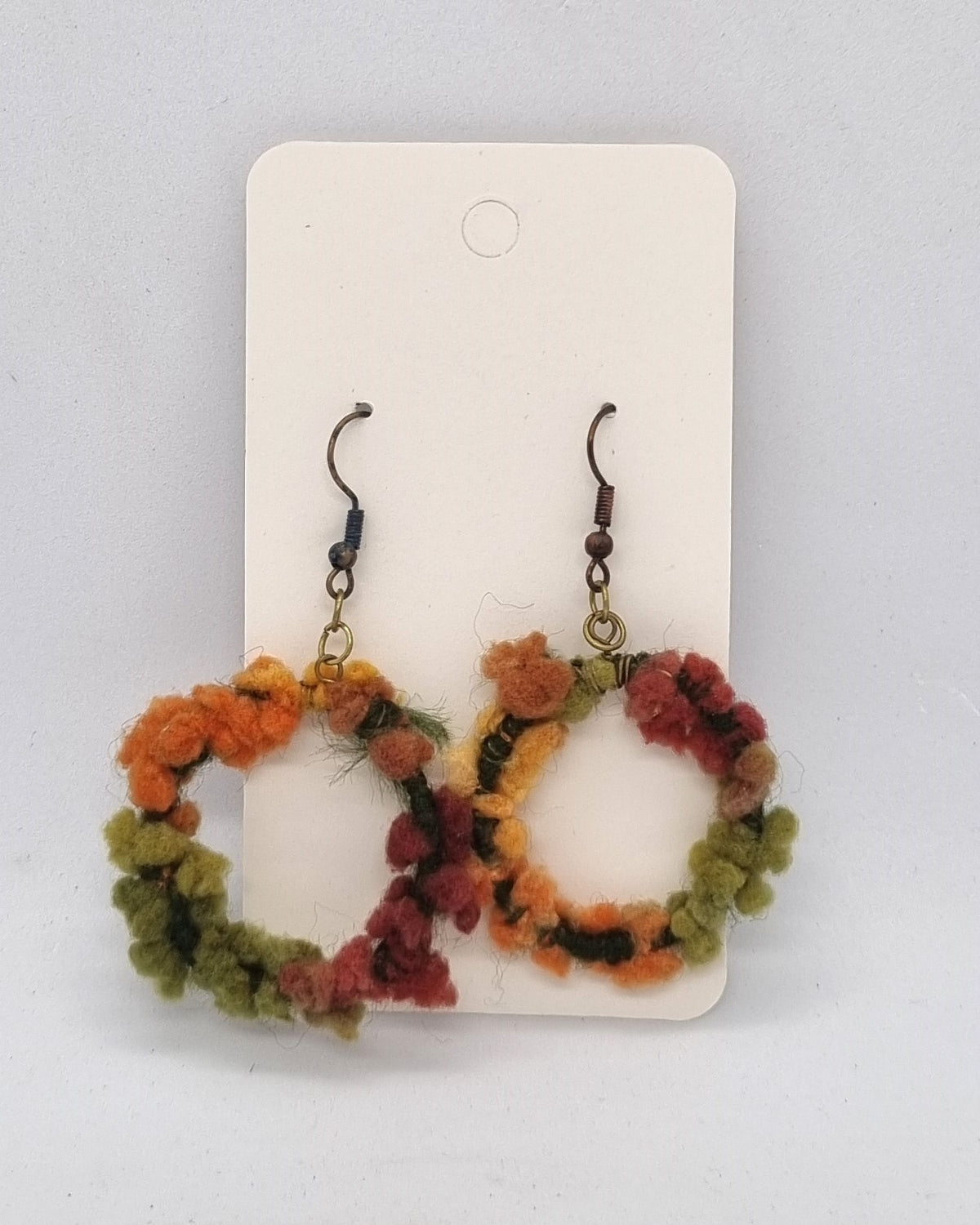 #19 - Earrings by Peter Thompson
