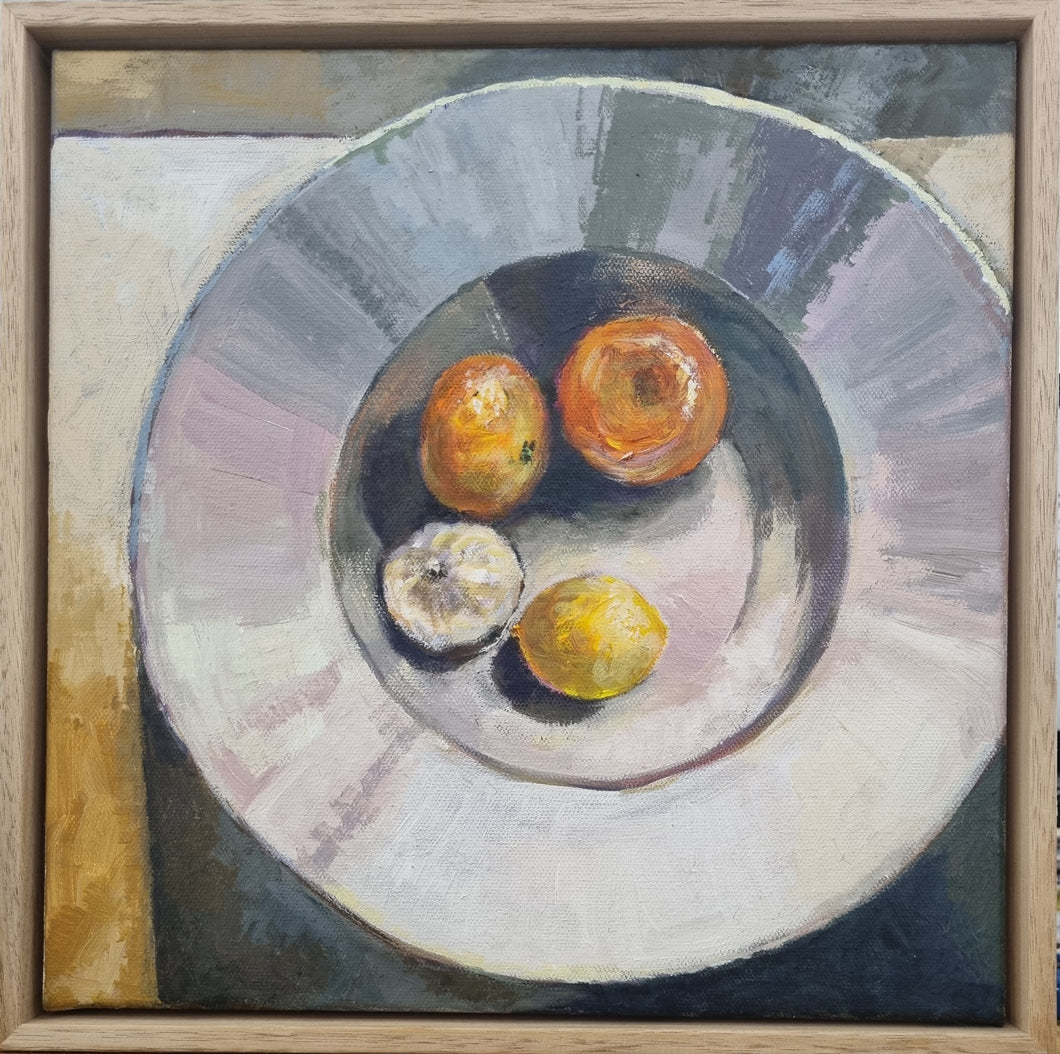 Mandarin, Lemon, Garlic on a Plate