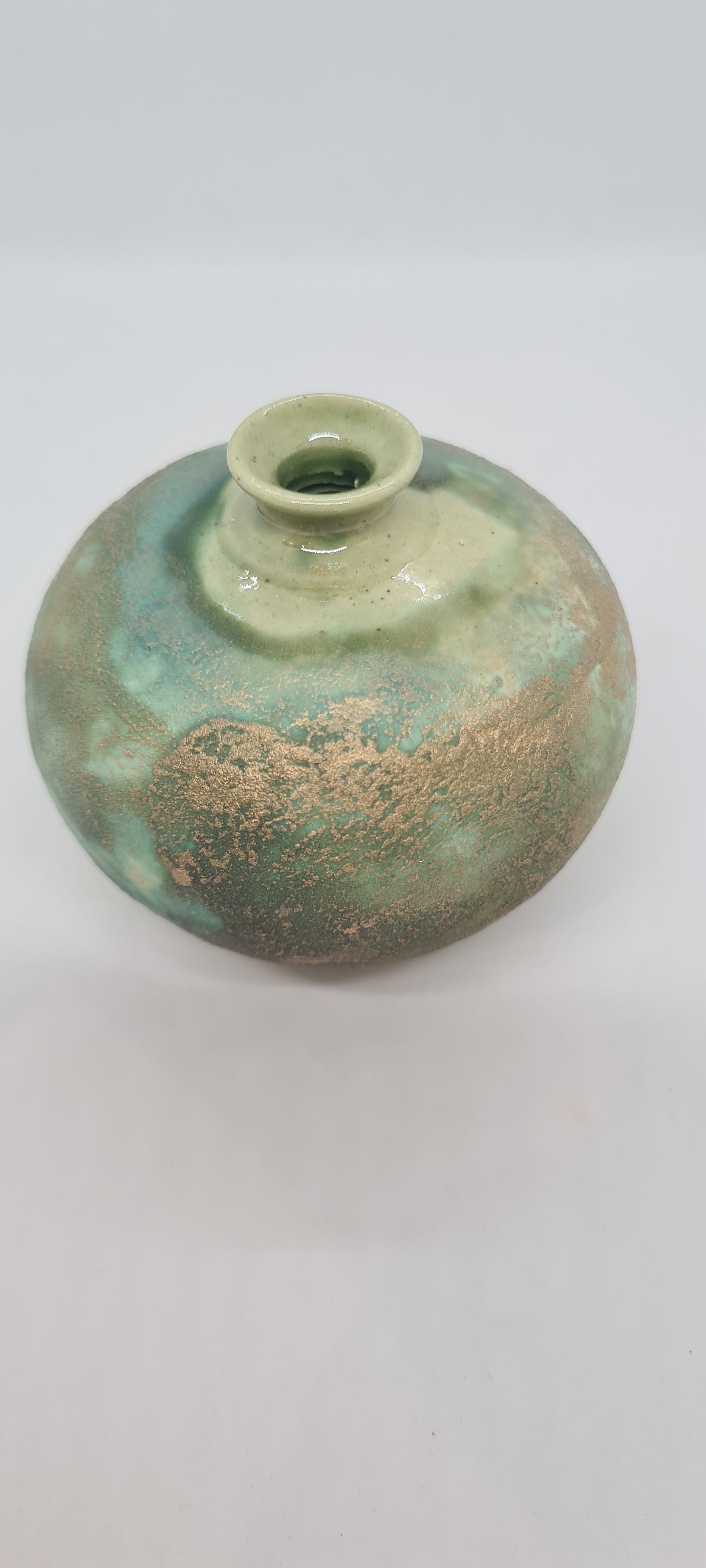 Small rough green glazed vases