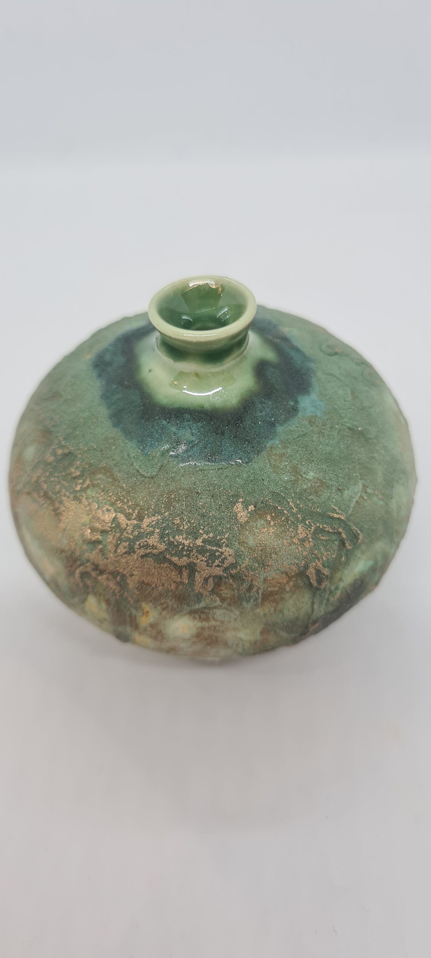 Small rough green glazed vases