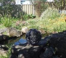Load image into Gallery viewer, Sphere 2 - Black - Like the shoreline, this piece is both strong and vulnerable - shaped endlessly by tide and time.
