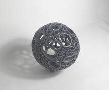 Load image into Gallery viewer, Sphere 2 - Black - Like the shoreline, this piece is both strong and vulnerable - shaped endlessly by tide and time.
